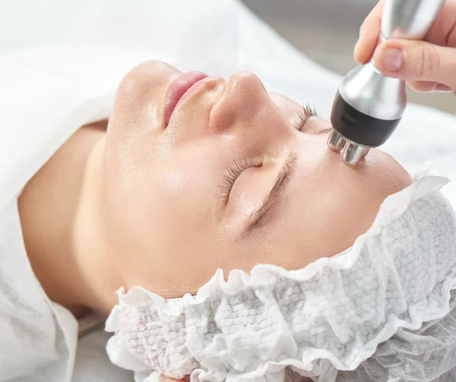 Patient reciving Facial Radio Frequency | The Aesthetic Surgery | Weight loss Cavitation