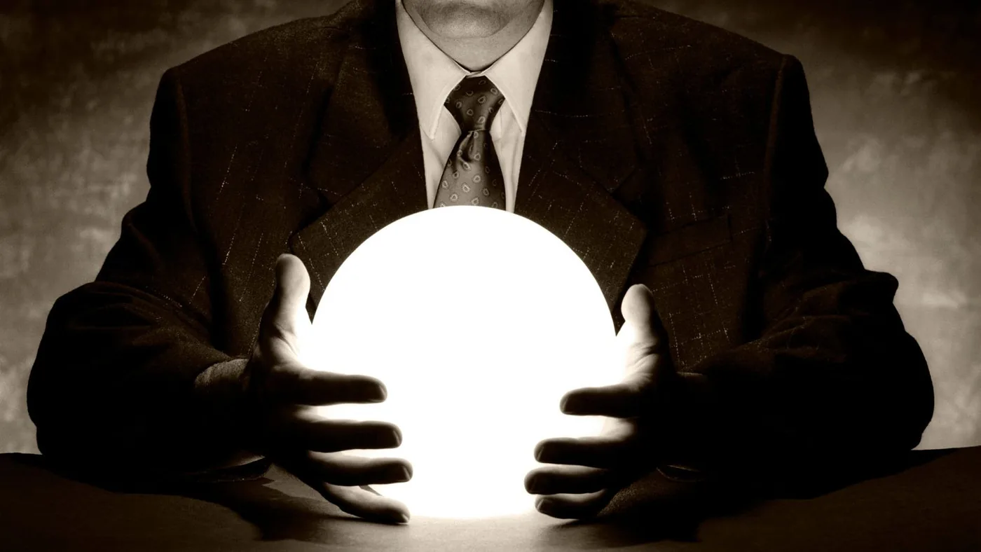 Man holding a crystal ball | The Aesthetic Surgery | Durham